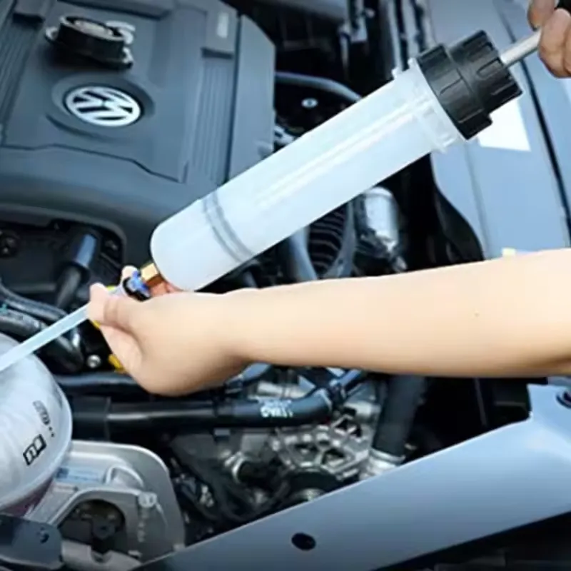 Oil transfer syringe